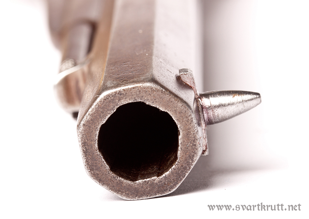 The front sight was damaged and has been replaced.