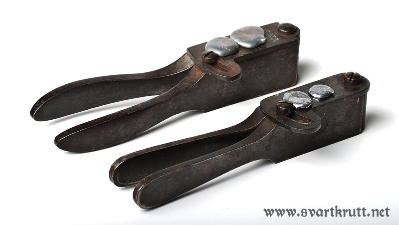 Colt mould (top) and Remington mould.