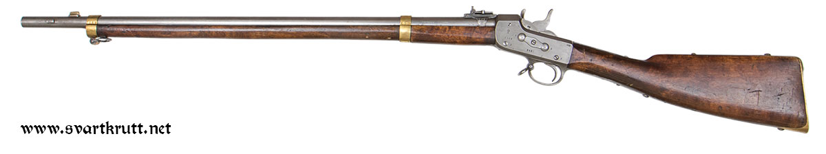 Forandring av den norske Marinens 4-linjers kammerladningsgevær Modell 1860 til Remington rolling block-mekanisme.